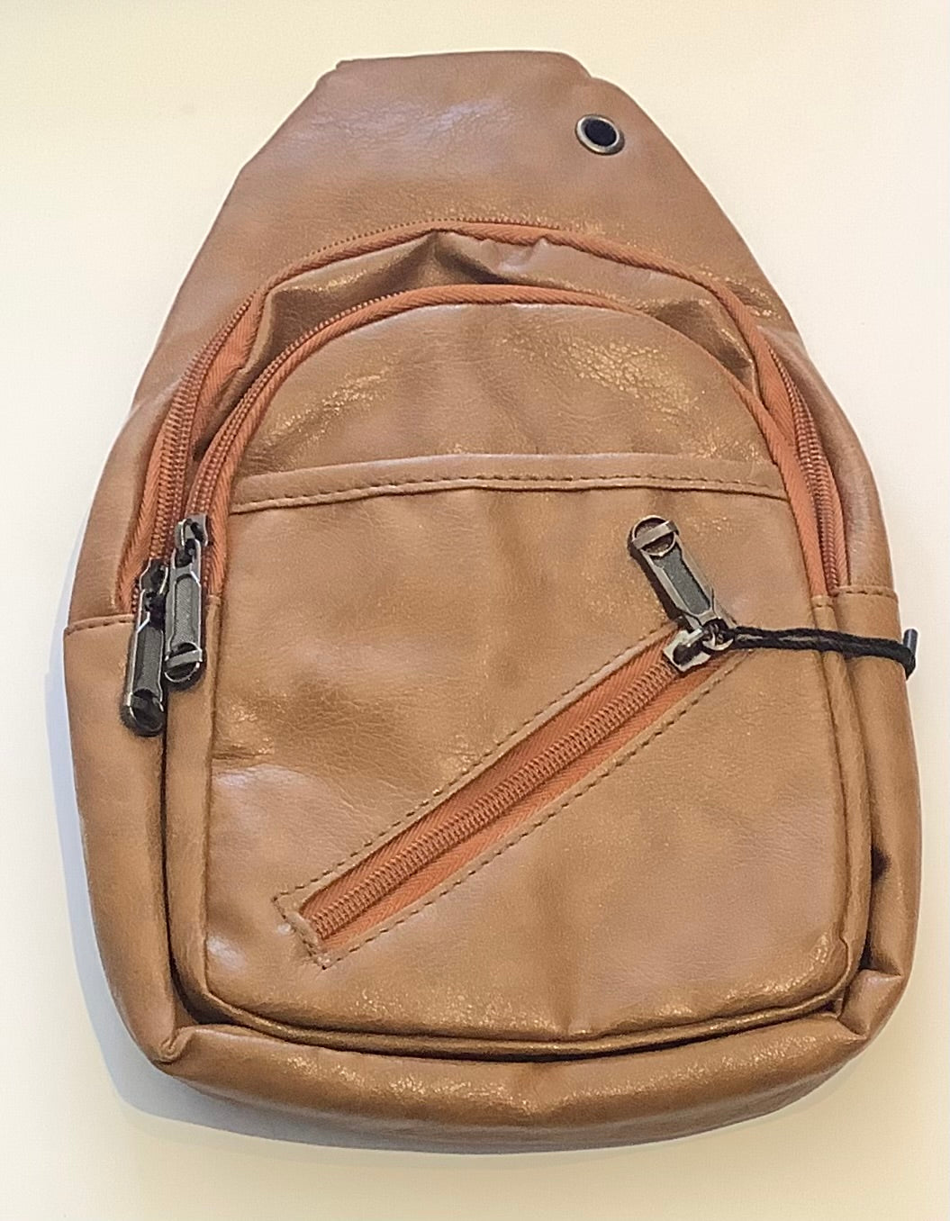 Brown leather sling bag