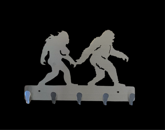 Bigfoot couple key hanger metal sign