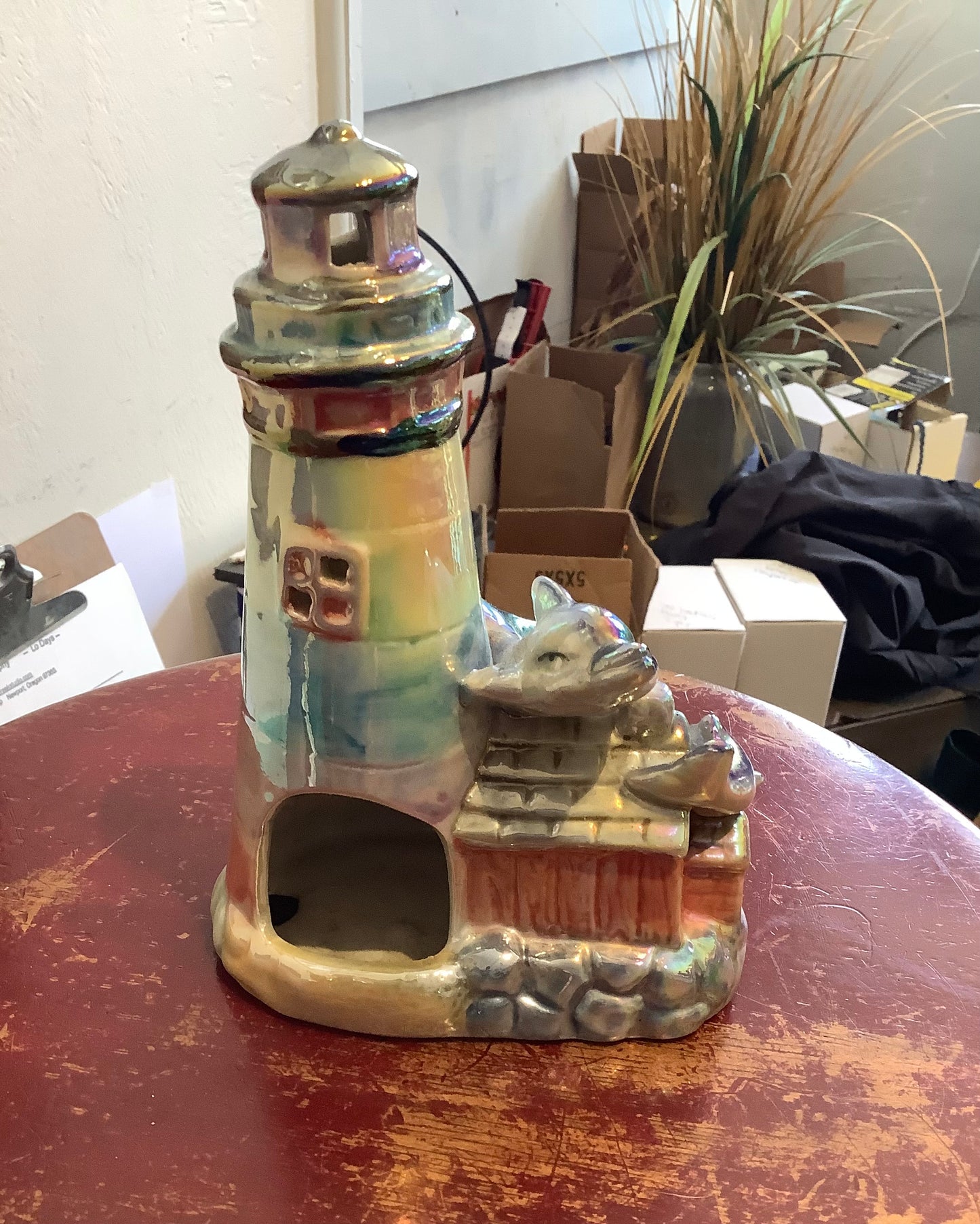 Lighthouse with dolphins