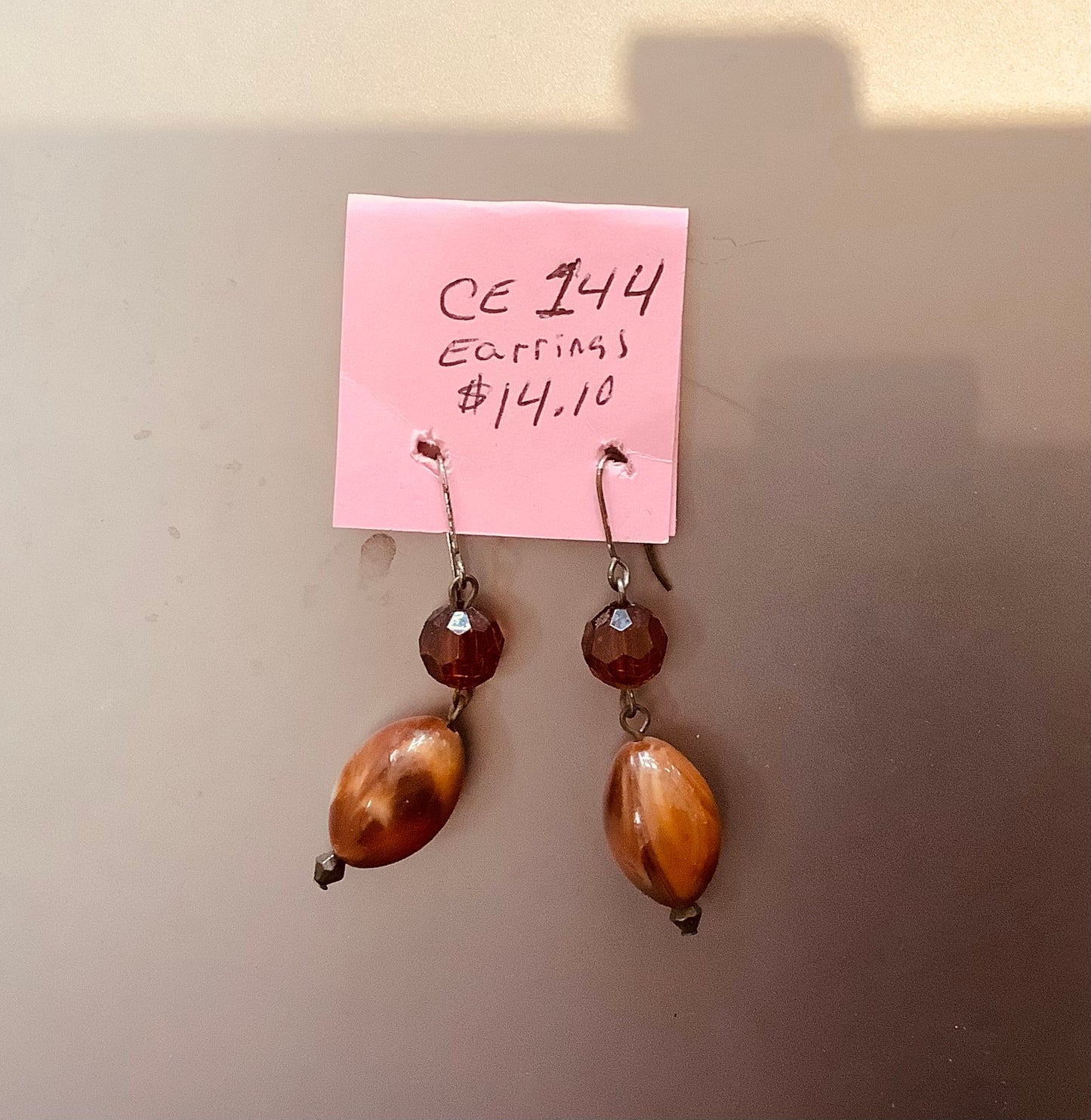 CE 144.  Earrings.