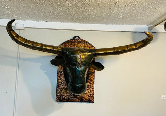 Bull metal art on wall. CC