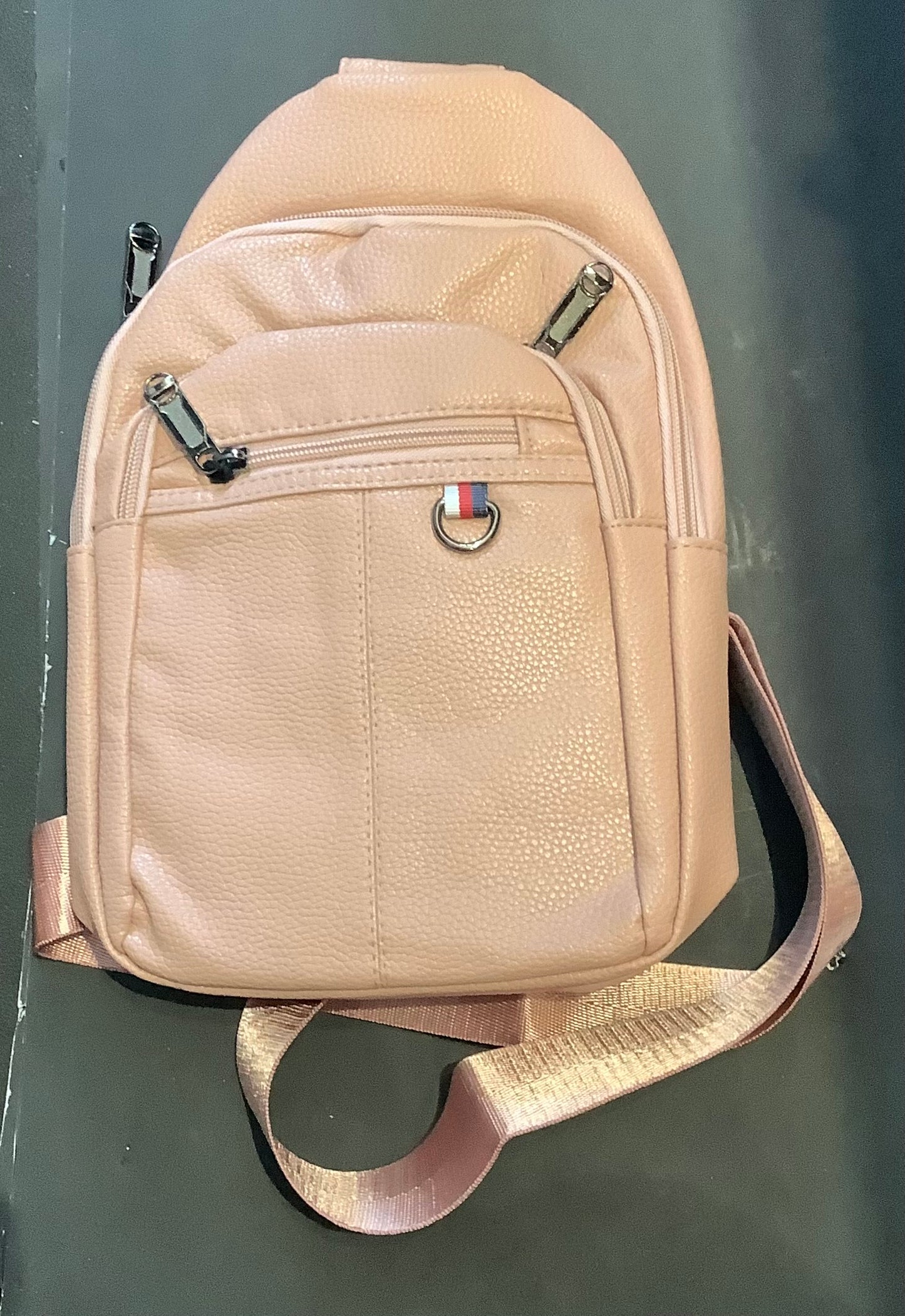 Faux leather sling rose bag