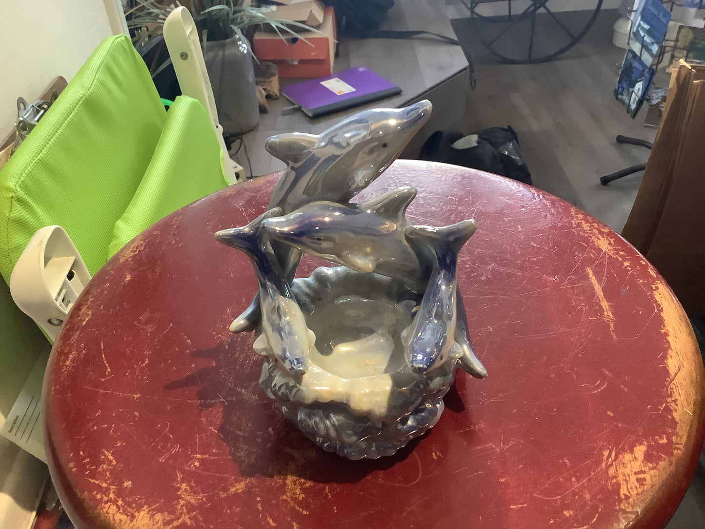 Dolphin ceramic statue.