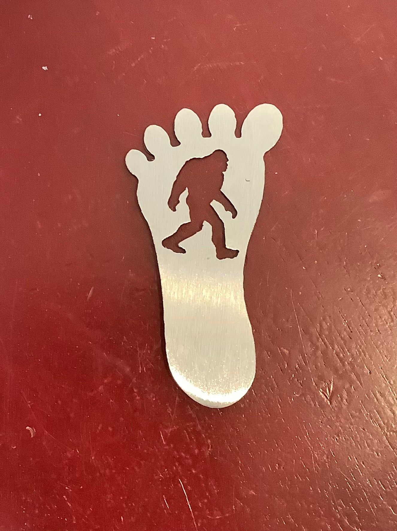 Bigfoot inside foot print magnet metal.Cc