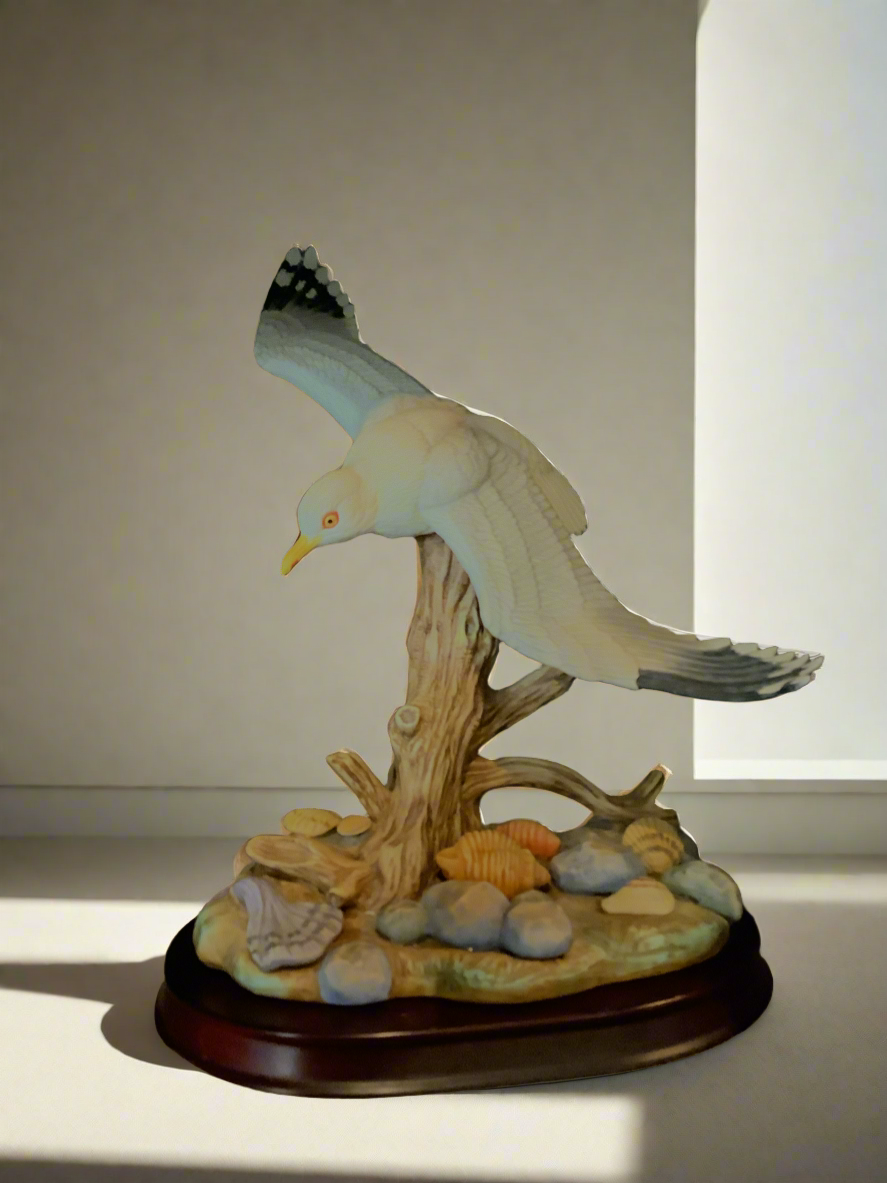 Seagull flying porcelain.Cc
